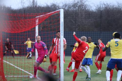 IMG 2375-Bowers-Alex-Bentley-clears-after-Sam-Youngs-header-had-rebounded-off-the-far-post-and-across-the-face-of-goal
