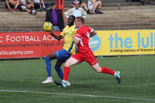 Enfield's Muhammadu Faal (L) and Carshalton's Luke Read