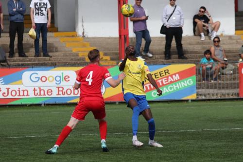 Enfield's Muhammadu Faal (R) and Carshalton's Luke Read