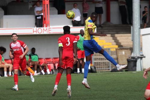 Enfield's Muhammadu Faal heads the ball past Paris Hamilton-Downes (3)