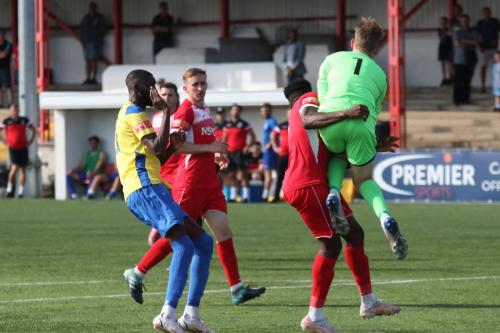 Carshalton keeper Tyler McCarthy collides with his captain, Paris Hamilton-Downes