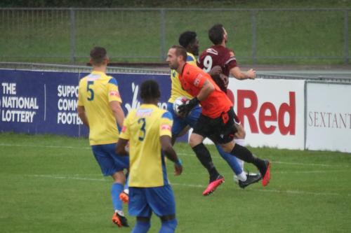 IMG 5094-Enfield-keeper-Nathan-McDonald-gathers-ahead-of-Charlie-Sheringham-9