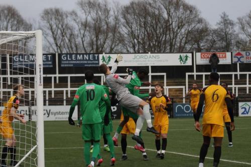 IMG 9274-Cray-keeper-Bailey-Vose-collides-with-Andre-Coker