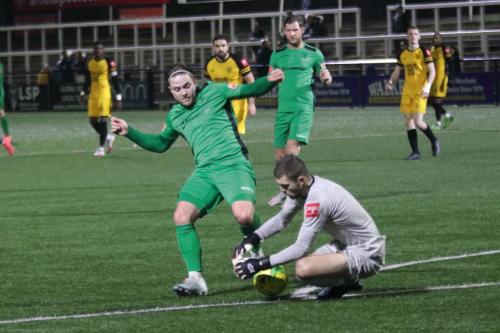 IMG 9465-Lewis-Taaffe-knocks-the-ball-past-keeper-Bailey-Vose-before-findng-the-empty-net-to-make-it-4-4