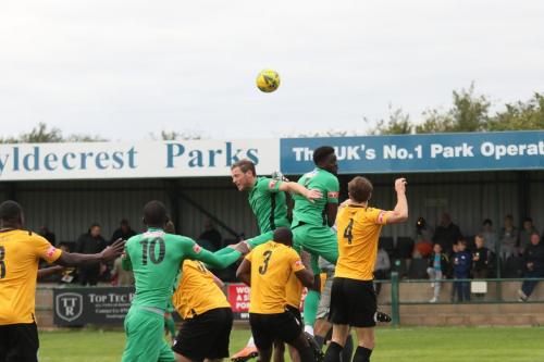 IMG 6363-Enfields-Adam-Cunnington-green-centre-and-Jerrt-Gyebi-challenge-in-the-build-up-to-the-opening-goal
