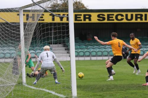 IMG 6621-Enfields-Lyle-Della-Verde-green-crosees-but-is-tackled-late-to-earn-a-penalty-which-he-took-himsel-but-missed