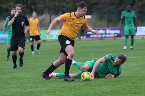 IMG 6638-East-Thurrocks-Ryan-Mallett-is-penalised-for-foul-on-Adam-Cunnington