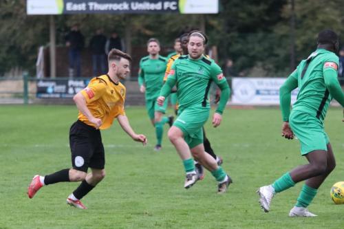 IMG 6645-Enfields-Lewis-Taaffe-centre-plays-the-ball-to-Percy-Kiangebeni