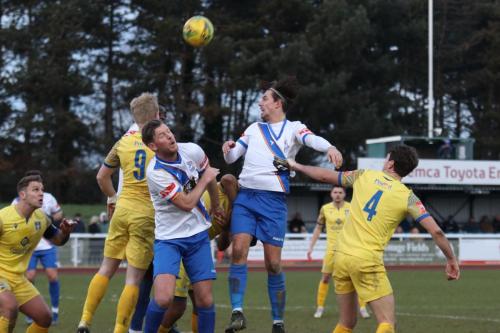 IMG 2692-Enfields-Sam-Youngs-wins-a-header