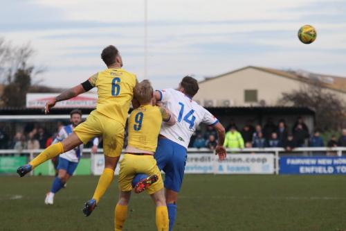 IMG 2696-Stortfords-Christopher-Harris-gets-caught-between-Ryan-Henshaw-L-and-Adam-Cunnington