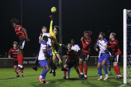 IMG 7200-Bedfont-keeper-George-Gay-punches-clear-under-pressure-from-Rian-Bray