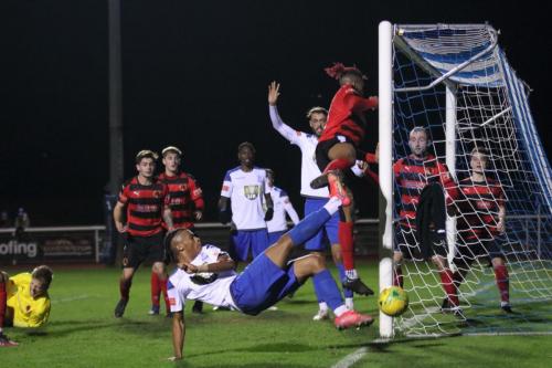 IMG 7204-Luke-Cook-cant-reach-the-ball-after-a-miscued-punch-by-Bedfont-keeper-George-Gay