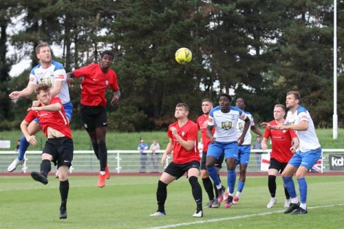 IMG 4544-Enfields-Adam-Cunnington-white-L-puts-a-header-on-target
