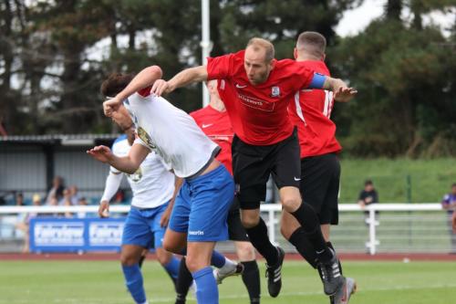 IMG 4571-Enfield-captain-Sam-Youngs-L-challenged-by-his-opposite-number-Paul-Wright