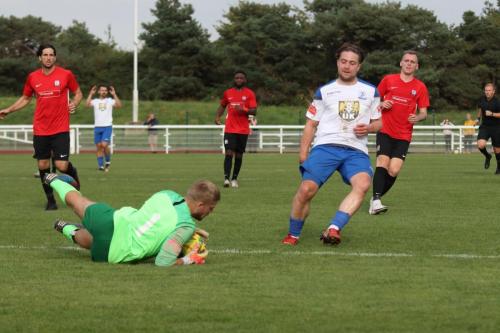 IMG 4732-Hadley-keeper-Luke-Ward-saves-ahead-of-Lewis-Taaffe