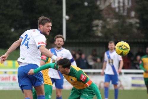 IMG 5175-Adam-Cunnington-L-heads-the-ball-past-Tom-Kavanagh