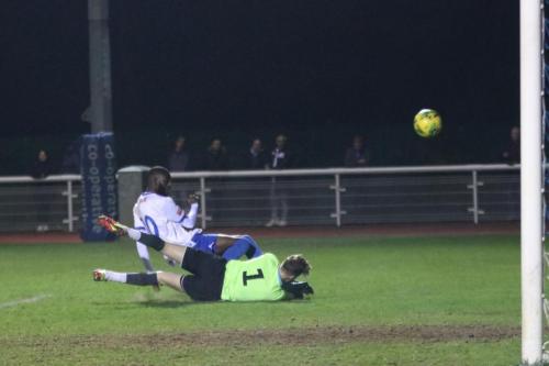 IMG 4603-Jacob-Adams-does-just-enough-to-prevent-Muhammadu-Faal-from-getting-a-shot-on-goal