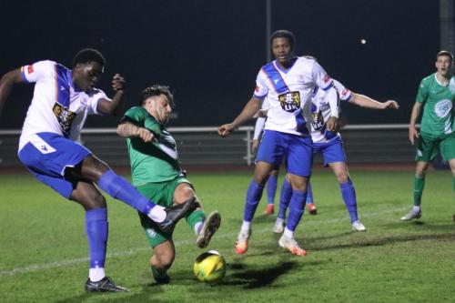 IMG 4649-Jerry-Gyebi-shoots-as-Archie-Burnett-tries-to-block