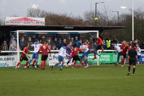 IMG 9583-Lewes-defender-Juevan-Spencer-heads-clear