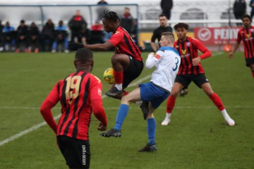 IMG 9586-Razz-Coleman-De-Graft-controls-the-ball-under-pressure-from-Ryan-Kirwan