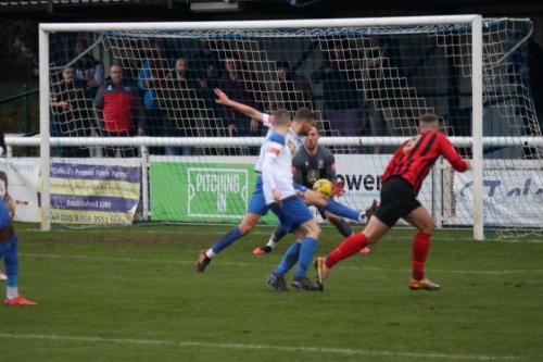 IMG 9617-Joe-Taylor-R-shoots-straight-at-Nathan-McDonald