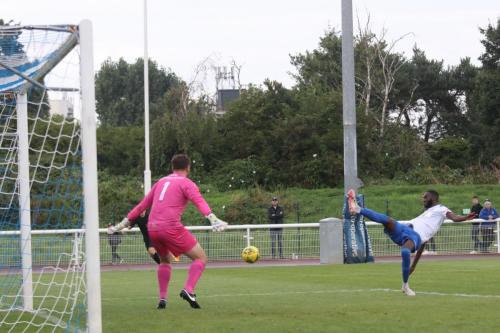 Muhammadu Faal stretches but can't quite make contact