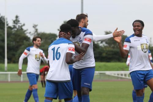 Ebrima-Sawaneh (16) celebrates his goal with Jerry Gyebi