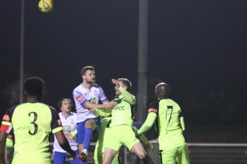 IMG 1113-Carshaltons-Bradley-Williams-half-clears-from-Rian-Bray-but-only-as-far-as-Nathan-Smith-who-scores-to-make-it-1-1