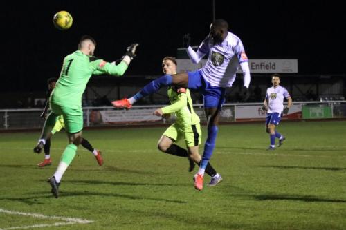 IMG 1199-Muhammadu-Faal-lifts-the-ball-over-the-onrushing-keeper-but-Bradley-Williams-behind-Faal-gets-back-to-clear