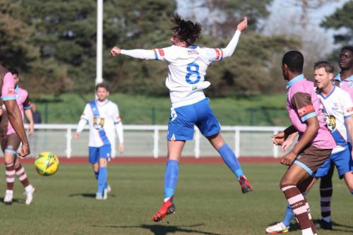 IMG 4170-Sam-Youngs-wins-a-header