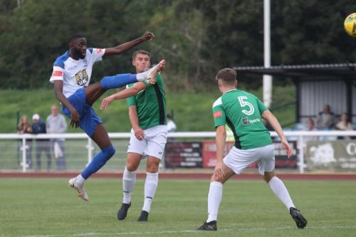 Enfield's Muhammadu Faal shoots from the edge of the box producing a good save from the keeper