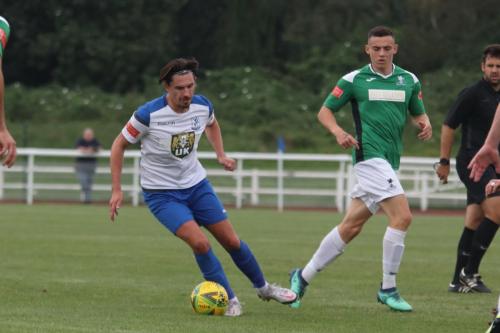 Enfield's Sam Youngs (L) and Dereham's Luke Johnson