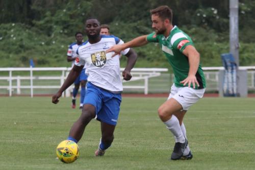 Enfield's Percy Kiangebeni (L) and Dereham's Robbie Linford