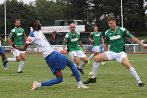 Enfield's Muhammadu Faal plays the ball across the box