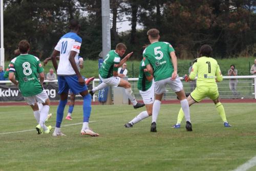Andre Coker (pink boots) scores the first Enfield goal 