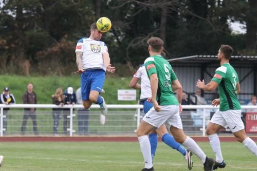 Lee Chappell heads across goal