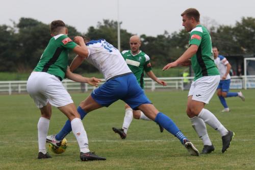 Enfield's Adam Cunnington and Dereham's Ashton Fox (L), Dion Frary (R) and Andrew Fisk