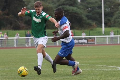 Dereham's Matthew Castellan (L) and Enfield's Percy Kiangebeni