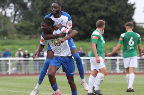 Andre Coker celebrates his second goal with the help of Muhammadu Faal