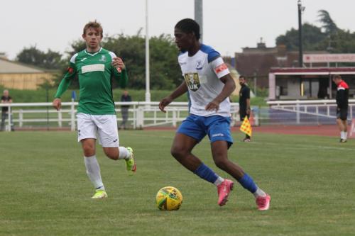 Enfield's Andre Coker (R) and Dereham's Rhys Logan