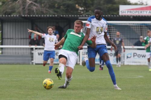 Dereham's Dion Frary (L) and Enfield's Muhammadu Faal