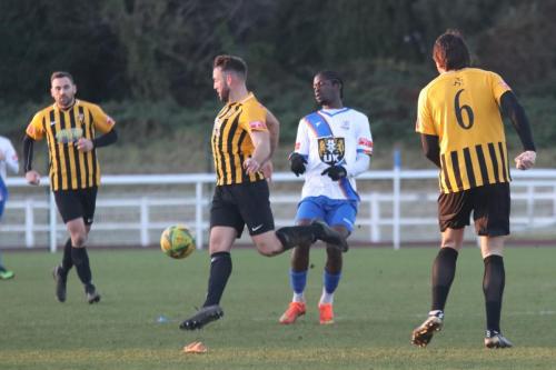 IMG 8560-Folkestones-Josh-Vincent-stripes-centre-clears-from-Andre-Coker