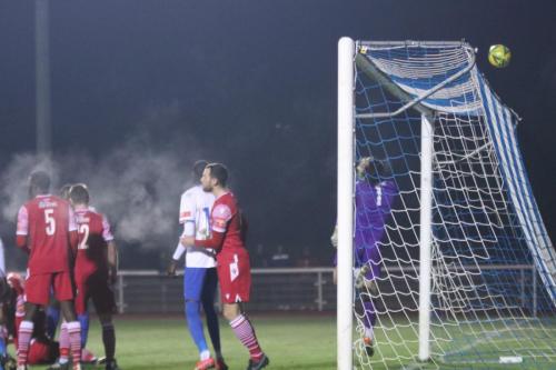 IMG 8111-As-the-ball-clears-the-Hornchurch-bar-players-from-both-sides-react-to-the-award-of-a-penalty