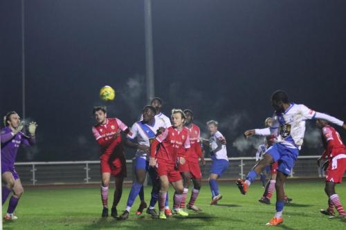 IMG 8200-Enfields-Andre-Coker-sees-his-shot-tipped-over-by-Joe-Wright