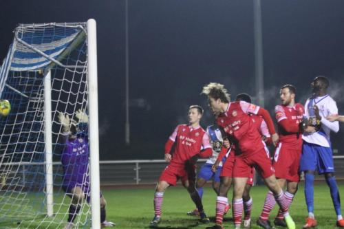IMG 8206-A-header-from-Sam-Youngs-out-of-shot-is-deflected-by-Mickey-Parcell-for-the-winning-goal-Enfield-celebrate-the-winning-goal-scored-by-Sam-Youngs-R