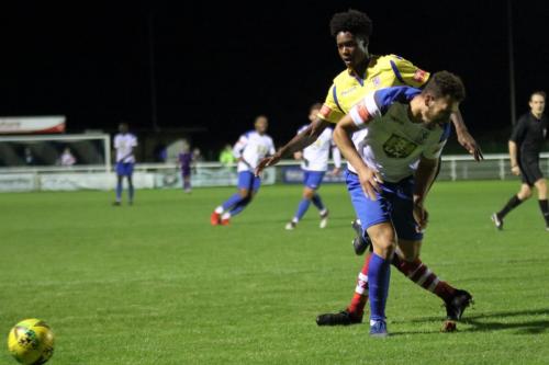 IMG 5343-Kingstonians-Bryant-Akono-Bilongo-yellow-clears-from-Lyle-Della-Verde