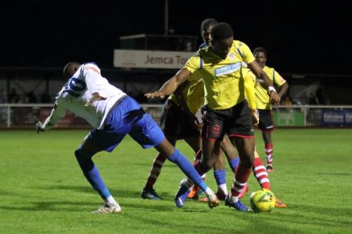 IMG 5411-Kingstonians-Jerry-Puemo-takes-the-ball-away-from-the-challenge-of-Muhammadu-Faal-10