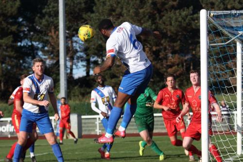 IMG 6804-Enfields-Harold-Joseph-heads-the-ball-across-the-Police-box