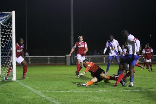 IMG 5995-Wingate-keeper-Ben-Goode-blocks-Percy-Kiangebenis-shot