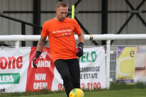 IMG 6056-Enfields-Nathan-McDonald-wearing-a-warm-up-top-in-support-of-National-hate-crime-awareness-week